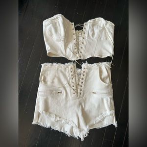Two piece white lace up shorts and corset set